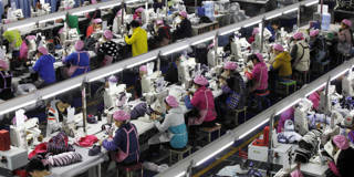 stiglitz217_Xinhua News Agency_Getty Images_factory workers