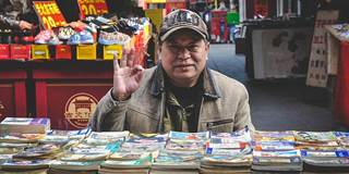 Kiosk salesman in China