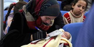 Syrian refugee and her baby.
