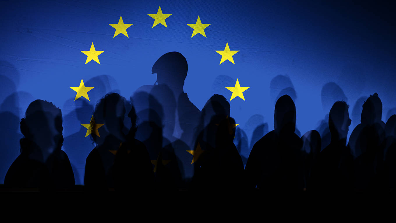pisaniferry98_pbombaertGettyImages_shadowpeopleinfrontofEUflag
