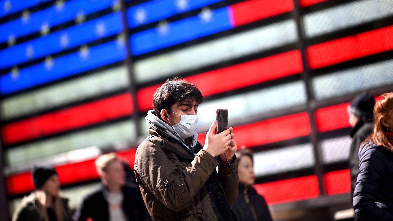 qian1_JOHANNES EISELEAFP via Getty Images_covid mask USA