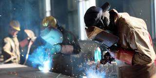 A worker cutting steel at a factory in Huaibei in China's eastern Anhui province