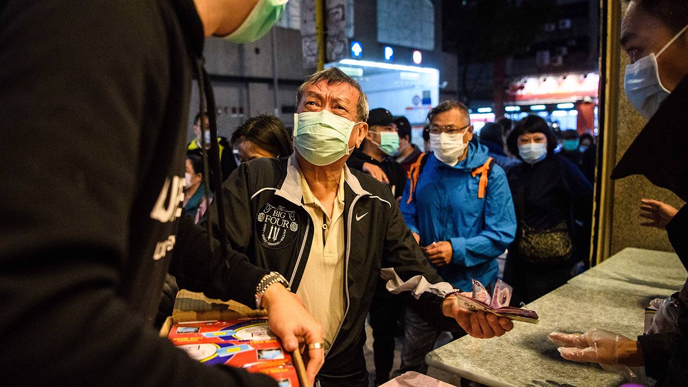 yu53_ANTHONY WALLACEAFP via Getty Images_chinacoronaviruseconomy