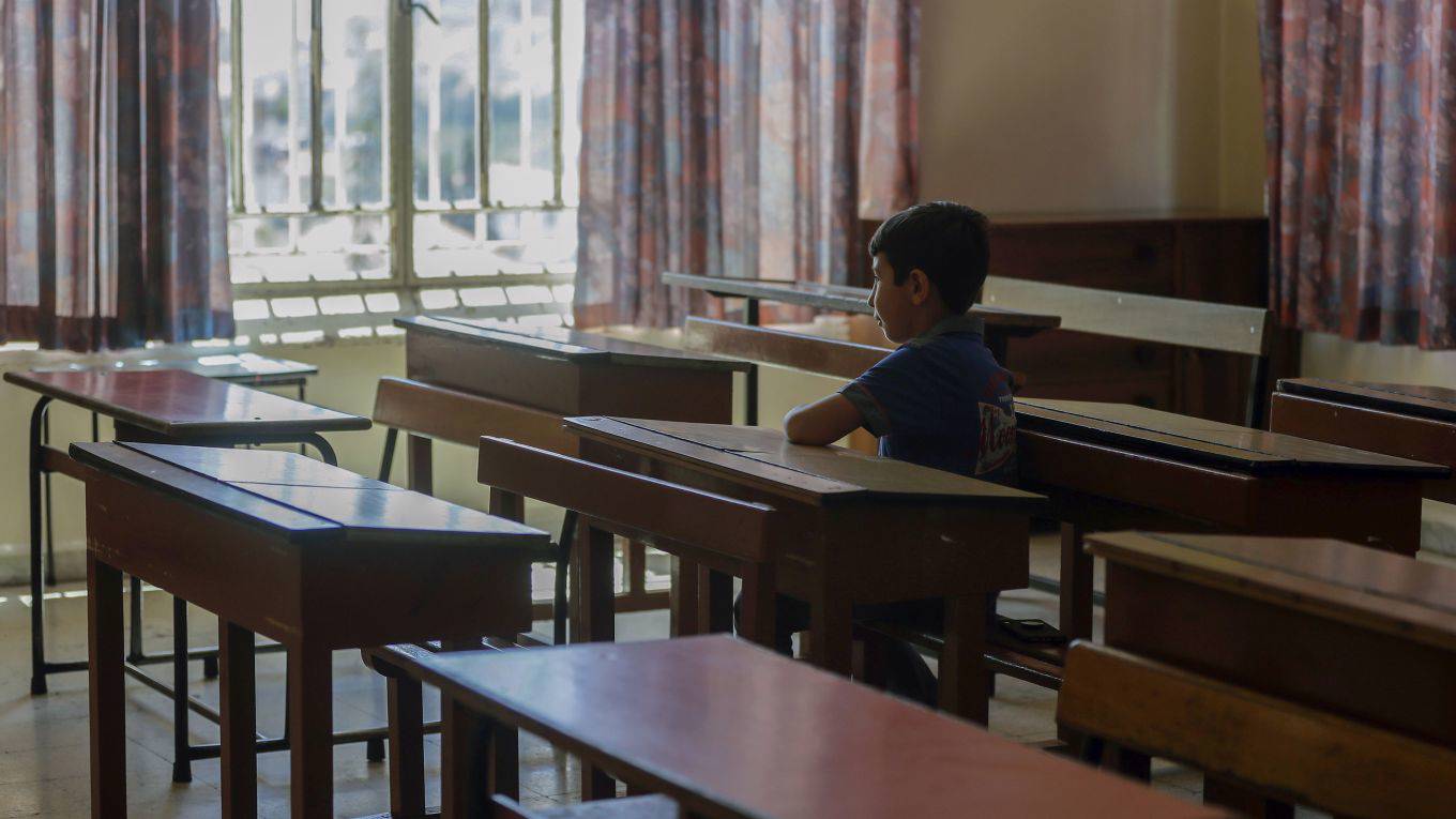 watkins20_ JOSEPH EIDAFP via Getty Images_child in school