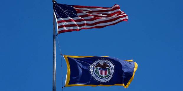 taylor16_OLIVIER DOULIERYAFP via Getty Images_fed reserve flag