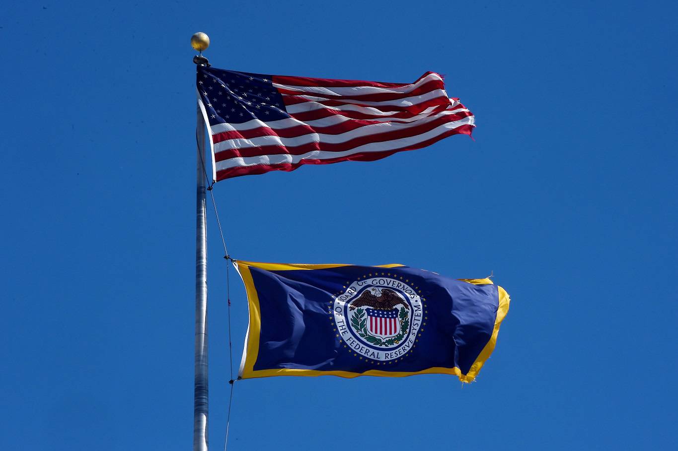 taylor16_OLIVIER DOULIERYAFP via Getty Images_fed reserve flag