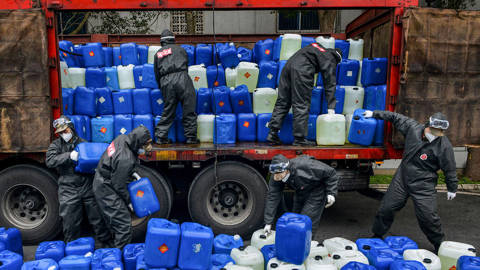 oqubay1_STRAFP via Getty Images_chinacoronavirussuppliespolice