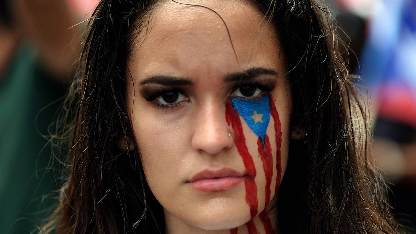 krueger17_RICARDOARDUENGOAFPGettyImages_puertoricowomanprotestpaint