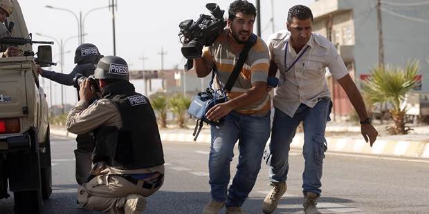 Journalists in a war zone