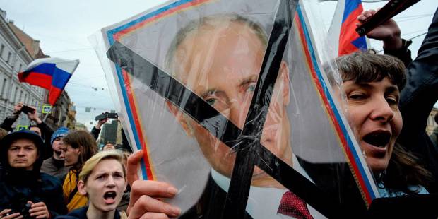Opposition supporters attend an unauthorized anti-Putin rally