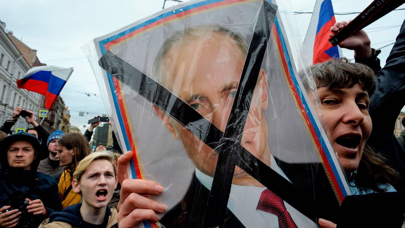 Opposition supporters attend an unauthorized anti-Putin rally