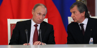Rosneft's President Igor Sechin  and Vladimir Putin
