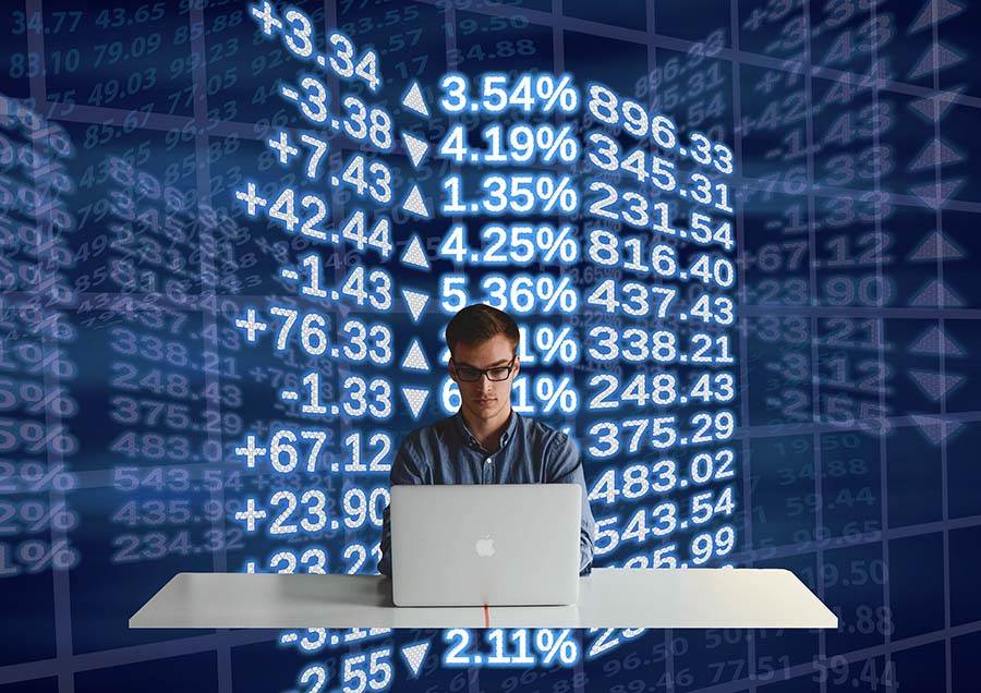 Man trading stocks online