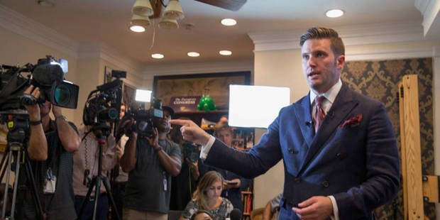 American white nationalist Richard Spencer addresses reporters from his office in Alexandria, VA, on August 14, 2017.