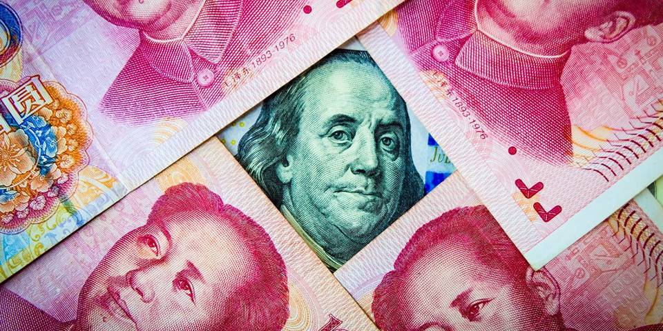 gros125_GettyImages_yuanoverlayingdollar