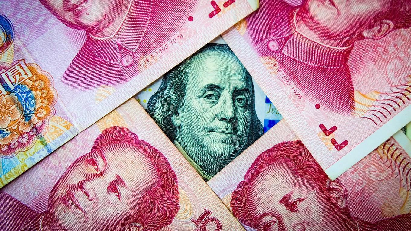 gros125_GettyImages_yuanoverlayingdollar