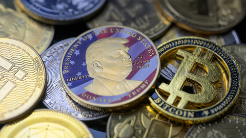 Donald Trump coin next to Bitcoin and other cryptocurrencies in Brussels, Belgium, August 5, 2025.