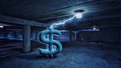 Dollar sign electrifying light in parking lot