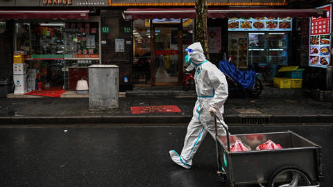 zhang57_ HECTOR RETAMALAFP via Getty Images_shanghailockdowncovid