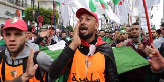 benami151_FaroukBaticheAnadoluAgencyGetty Images_algerianprotestmanyelling