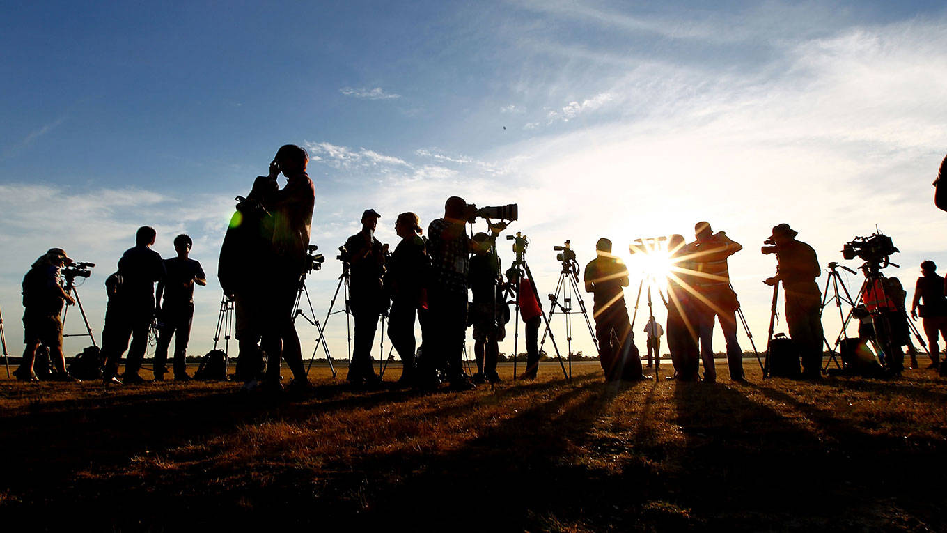 News reporters with cameras