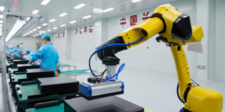 phelps30_Hu YuanjiaVCG via Getty Images_chinarobotworkertechnologymanufacturing