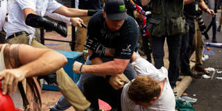 A White Supremacist beats a man