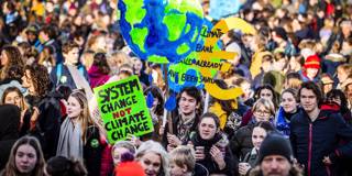 acemoglu21_REMKO DE WAALANPAFP via Getty Images_climatechangeprotest