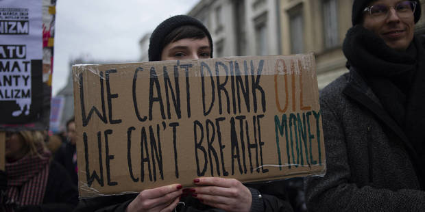 messner1_Aleksander KalkaNurPhoto via Getty Images_climatechangeprotestsign