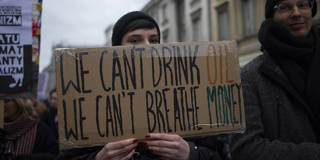 messner1_Aleksander KalkaNurPhoto via Getty Images_climatechangeprotestsign