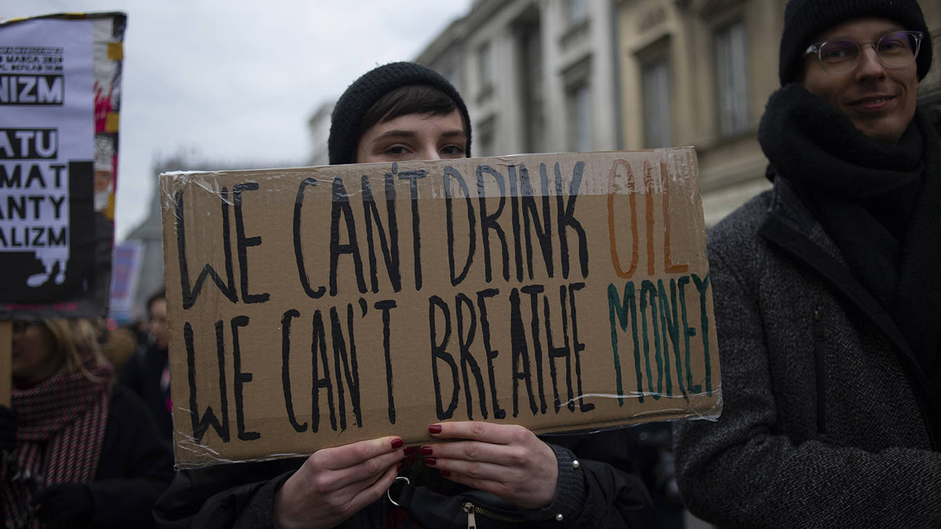 messner1_Aleksander KalkaNurPhoto via Getty Images_climatechangeprotestsign