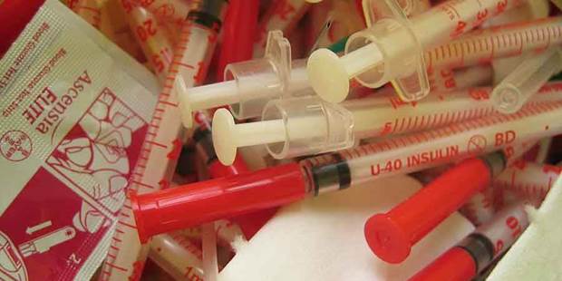 Insulin syringes.