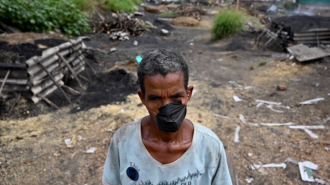 ghosh39_LUIS ROBAYOAFP via Getty Images_covidpoverty