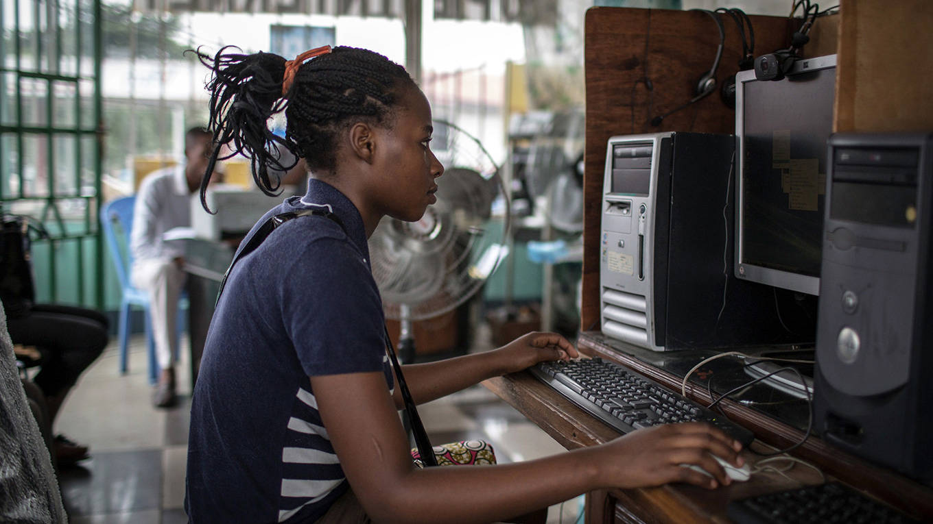 Clients surf the internet in Congo