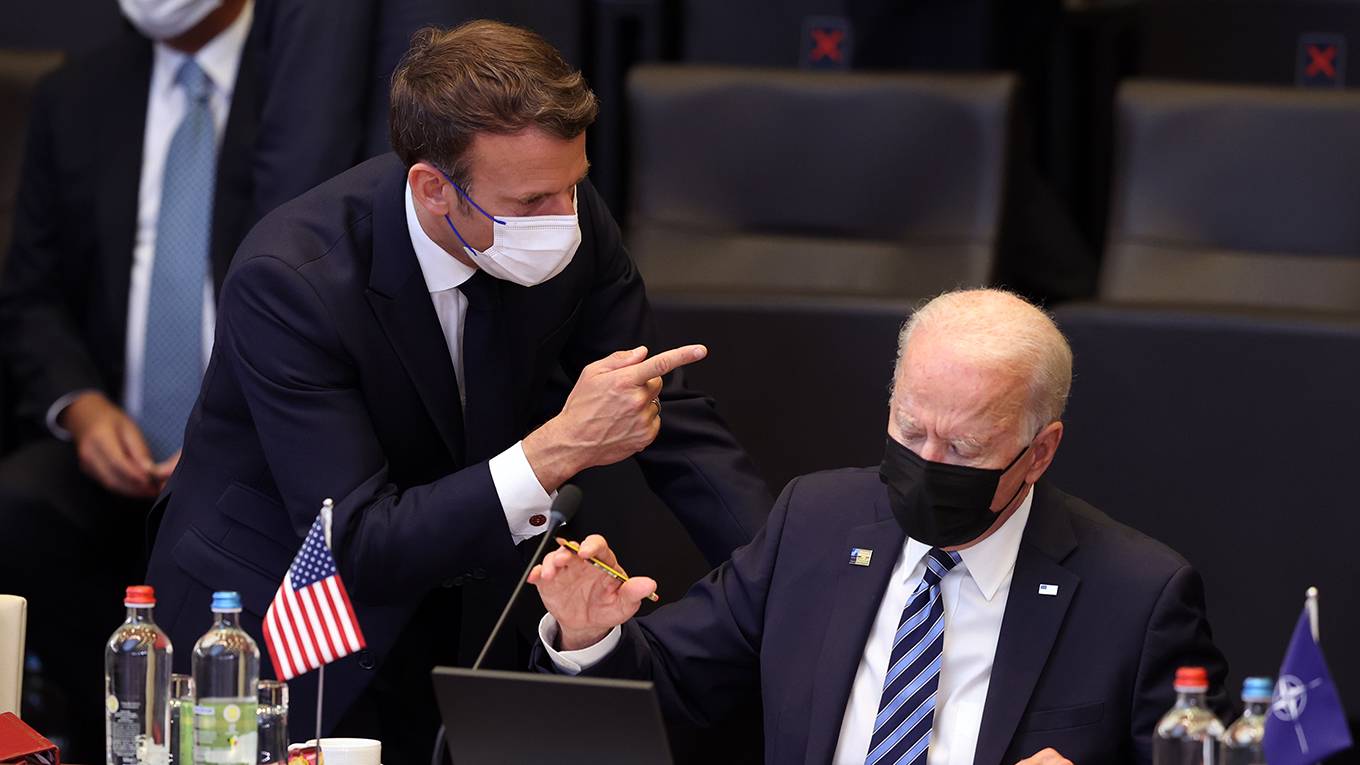 varoufakis83_Dursun AydemirAnadolu Agency via Getty Images_bidenmacron