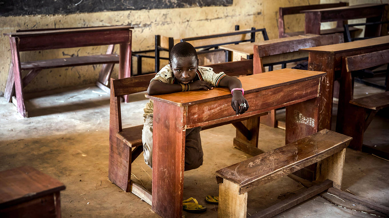 brown58_LUISTATOAFPGettyImages_sadboyinemptyclassroom