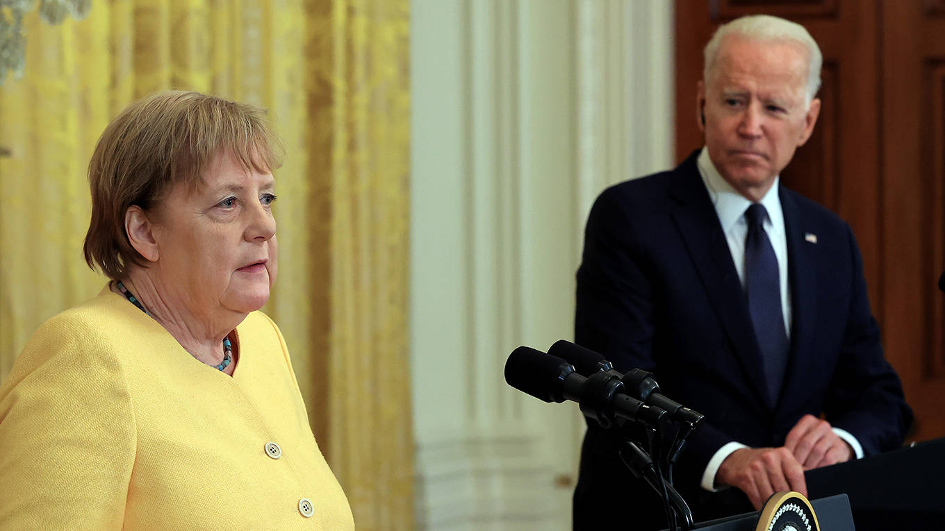 fischer183_Chip SomodevillaGetty Images_merkelbiden