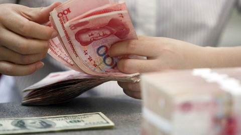 Renminbi stack of bills dollar