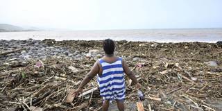 sack1_RICARDO MAKYNAFP via Getty Images_hurricane damage