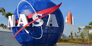 NASA logo on large planetary sculpture 