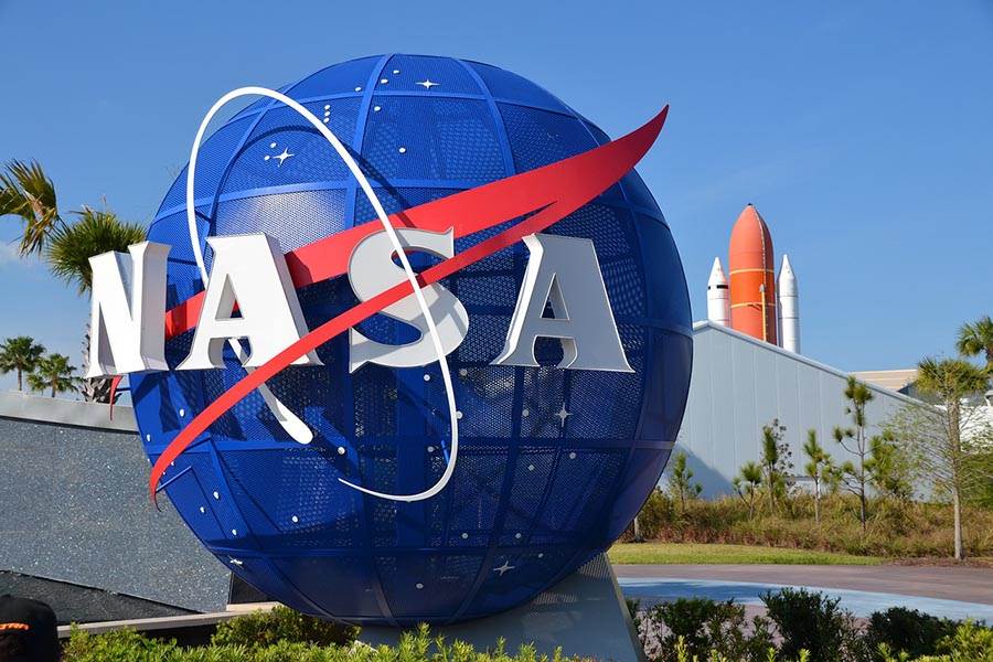 NASA logo on large planetary sculpture