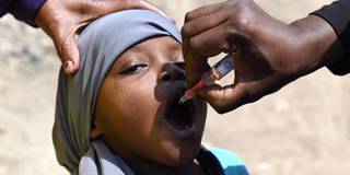 muganda1_SIMON MAINAAFP via Getty Images_vaccines
