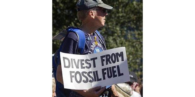 Fossil fuel protest sign