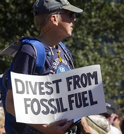 Fossil fuel protest sign