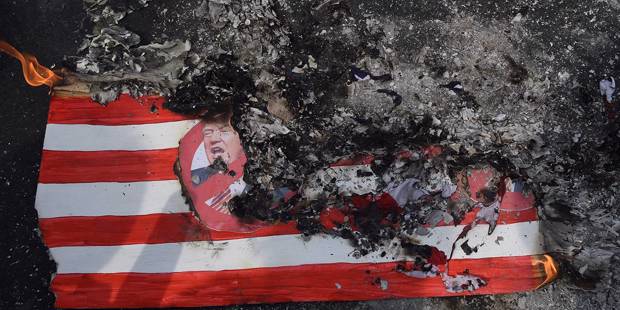 op_krastev1_TED ALJIBEAFP via Getty Images_USflagburntrump
