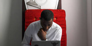 harison1_SEYLLOUAFPGetty Images_african man computer