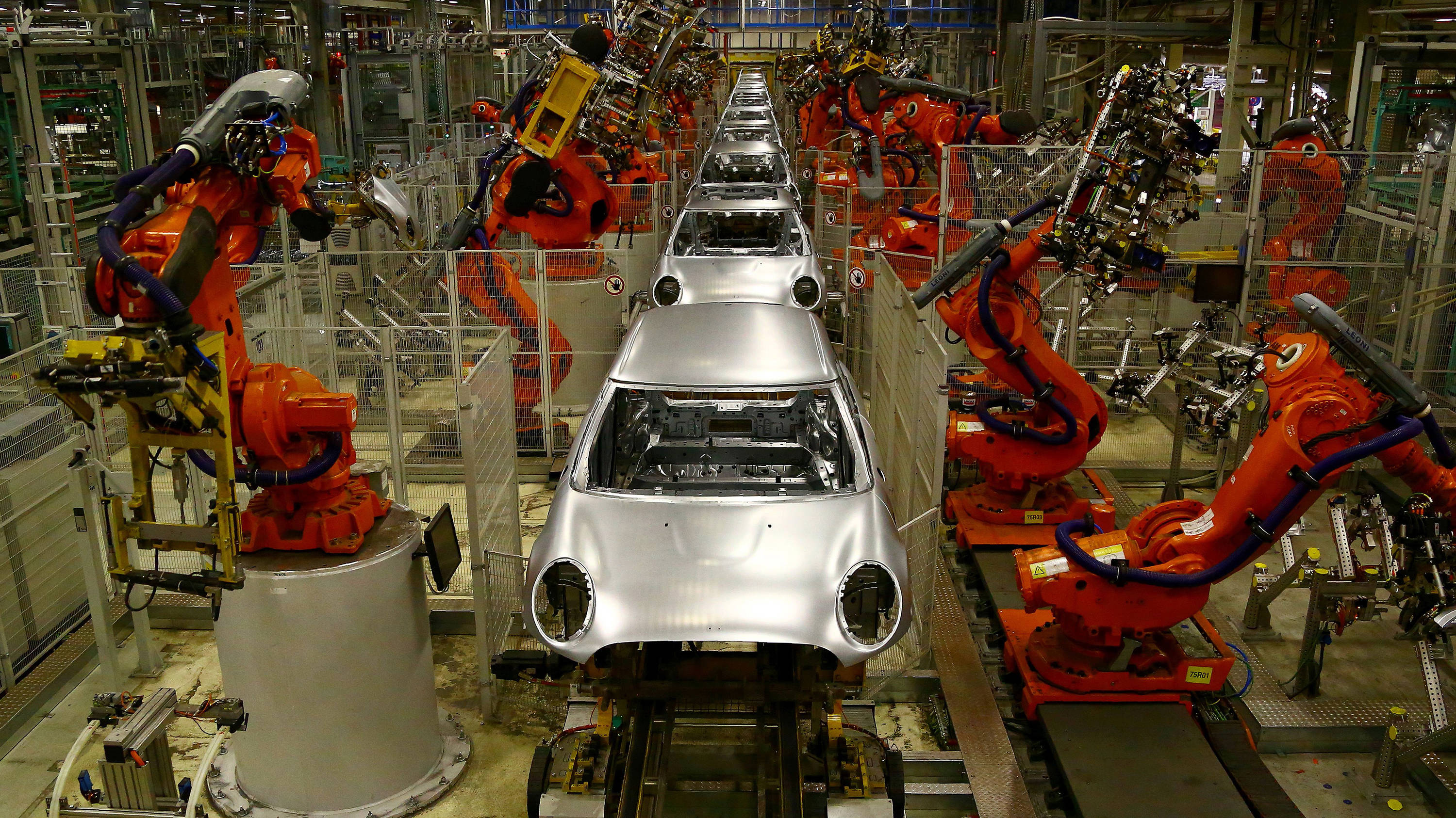 marin10_GEOFF CADDICKAFP via Getty Images_londonrobotmanufacturingcars