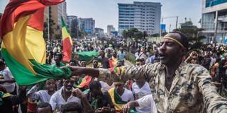 bedasso3_YONAS TADESSEAFP via Getty Images_ethiopiaprotestflag