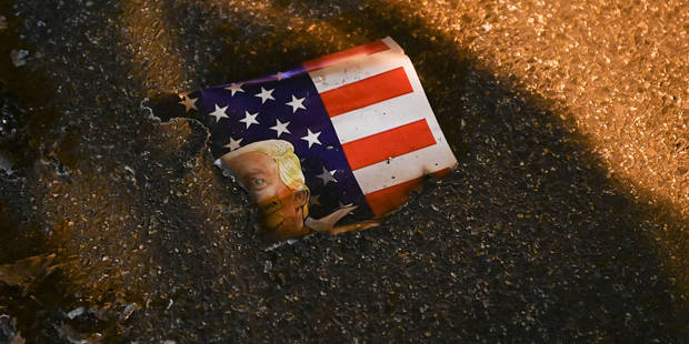 rodrik232_ ROBERTO SCHMIDTAFP via Getty Images_trumpflag