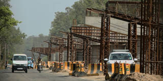 Under-construction flyover in India, showing infrastructure development in progress.